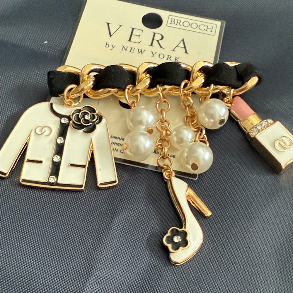 Vera Gold and Black Charm Bracelet